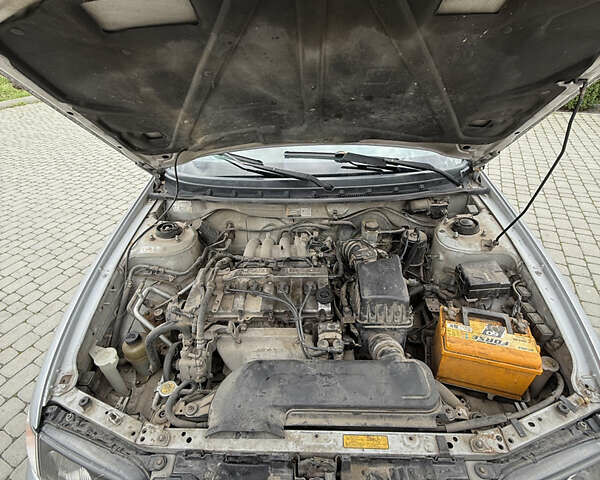 Сірий Мазда 626, об'ємом двигуна 1.8 л та пробігом 276 тис. км за 2000 $, фото 11 на Automoto.ua