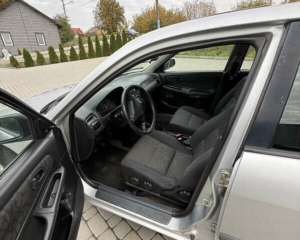 Сірий Мазда 626, об'ємом двигуна 1.8 л та пробігом 276 тис. км за 2000 $, фото 8 на Automoto.ua