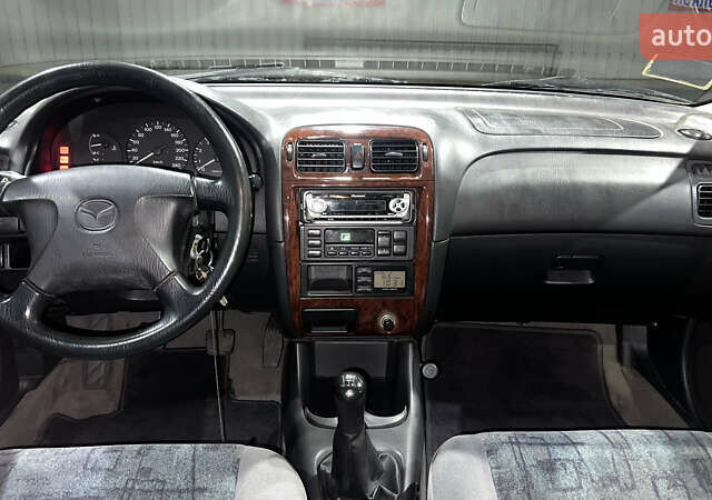 Сірий Мазда 626, об'ємом двигуна 2 л та пробігом 105 тис. км за 3800 $, фото 22 на Automoto.ua