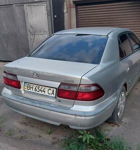 Серый Мазда 626, объемом двигателя 0 л и пробегом 290 тыс. км за 1200 $, фото 3 на Automoto.ua