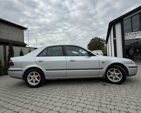 Сірий Мазда 626, об'ємом двигуна 1.8 л та пробігом 276 тис. км за 2000 $, фото 4 на Automoto.ua