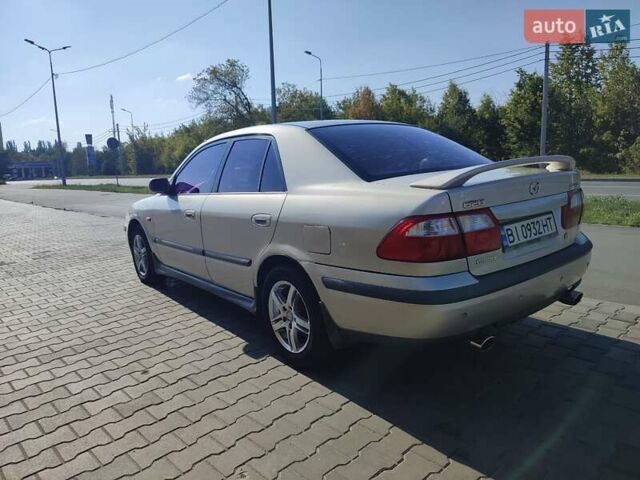 Серый Мазда 626, объемом двигателя 2 л и пробегом 350 тыс. км за 3300 $, фото 6 на Automoto.ua