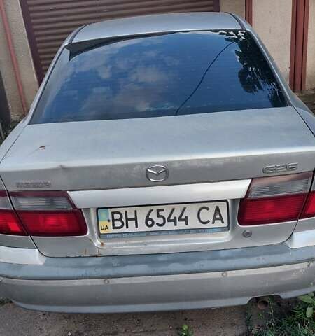 Серый Мазда 626, объемом двигателя 0 л и пробегом 290 тыс. км за 1200 $, фото 1 на Automoto.ua