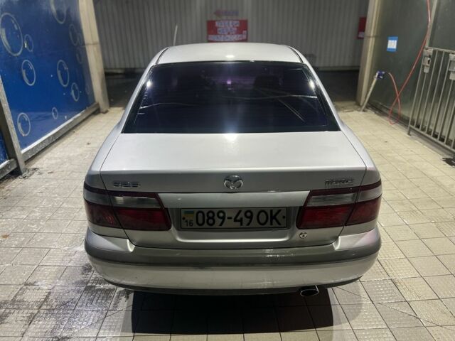 Серый Мазда 626, объемом двигателя 2 л и пробегом 105 тыс. км за 3800 $, фото 4 на Automoto.ua