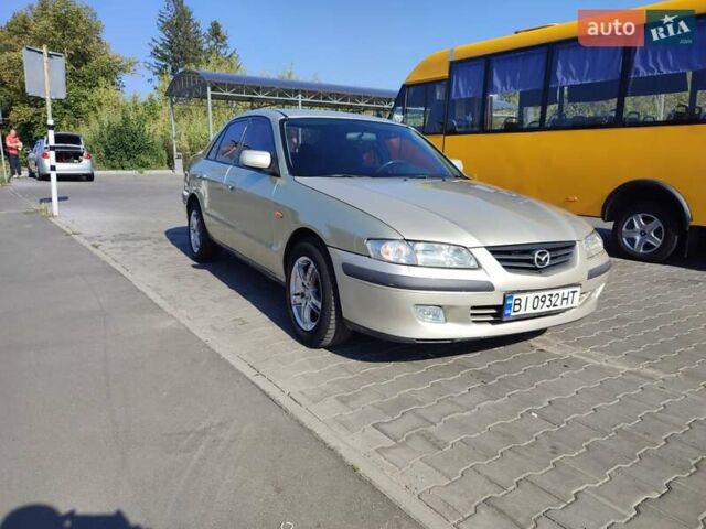 Серый Мазда 626, объемом двигателя 2 л и пробегом 350 тыс. км за 3300 $, фото 4 на Automoto.ua