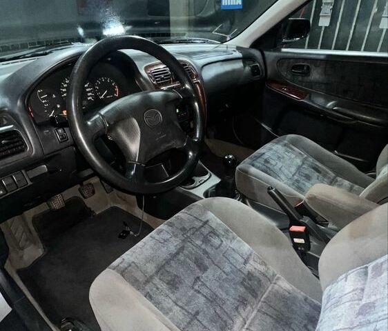 Серый Мазда 626, объемом двигателя 2 л и пробегом 105 тыс. км за 3800 $, фото 6 на Automoto.ua