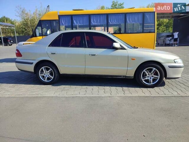 Серый Мазда 626, объемом двигателя 2 л и пробегом 350 тыс. км за 3300 $, фото 16 на Automoto.ua