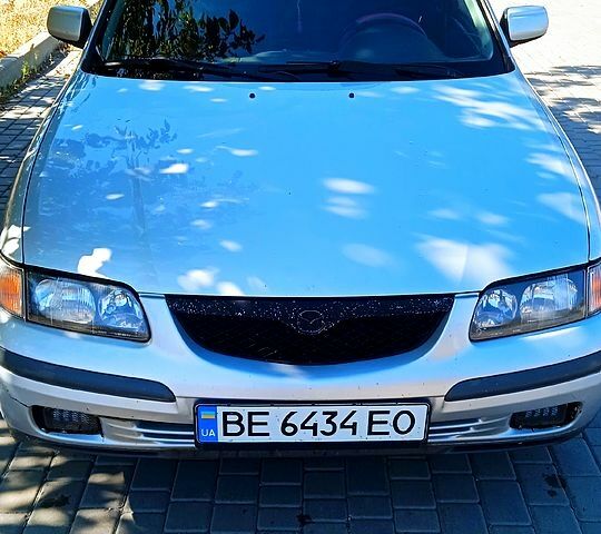 Серый Мазда 626, объемом двигателя 2 л и пробегом 285 тыс. км за 3100 $, фото 2 на Automoto.ua