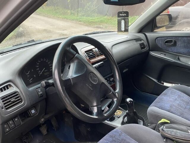 Сірий Мазда 626, об'ємом двигуна 1.8 л та пробігом 3 тис. км за 2000 $, фото 5 на Automoto.ua