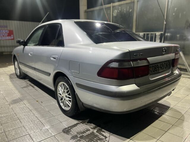 Серый Мазда 626, объемом двигателя 2 л и пробегом 105 тыс. км за 3800 $, фото 3 на Automoto.ua