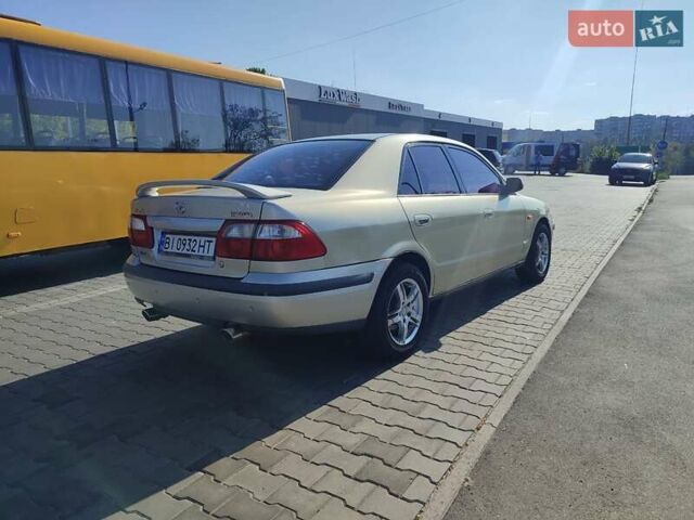 Серый Мазда 626, объемом двигателя 2 л и пробегом 350 тыс. км за 3300 $, фото 3 на Automoto.ua