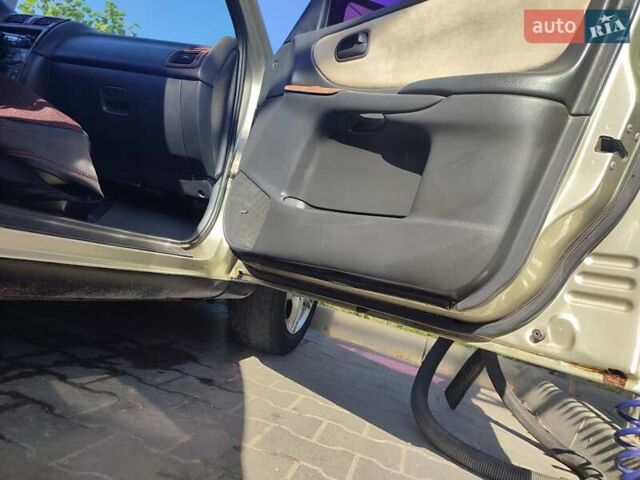 Серый Мазда 626, объемом двигателя 2 л и пробегом 350 тыс. км за 3300 $, фото 2 на Automoto.ua