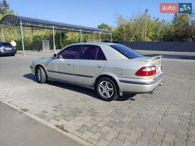 Серый Мазда 626, объемом двигателя 2 л и пробегом 350 тыс. км за 3300 $, фото 20 на Automoto.ua