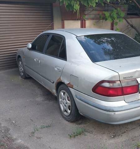 Серый Мазда 626, объемом двигателя 0 л и пробегом 290 тыс. км за 1200 $, фото 2 на Automoto.ua