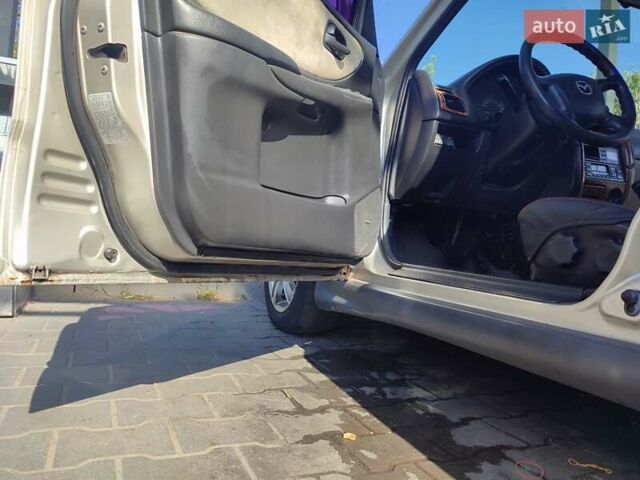 Серый Мазда 626, объемом двигателя 2 л и пробегом 350 тыс. км за 3300 $, фото 11 на Automoto.ua