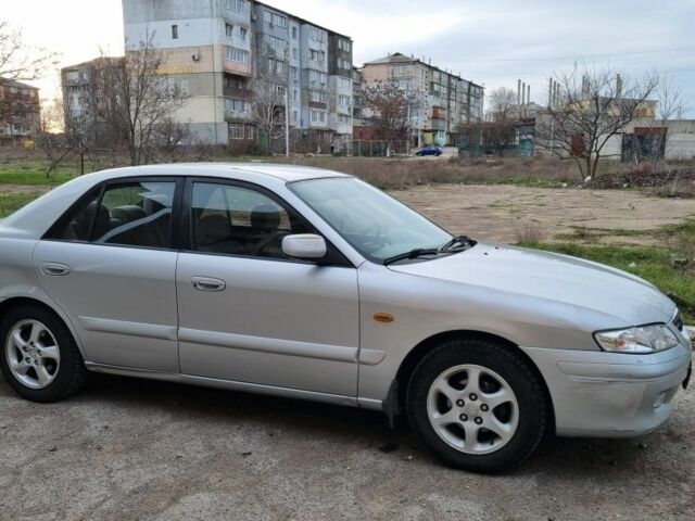 Серый Мазда 626, объемом двигателя 2 л и пробегом 230 тыс. км за 4500 $, фото 4 на Automoto.ua