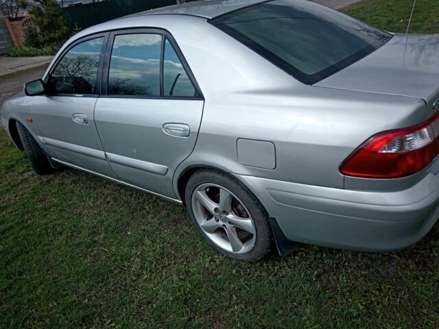 Сірий Мазда 626, об'ємом двигуна 1.8 л та пробігом 290 тис. км за 3100 $, фото 18 на Automoto.ua