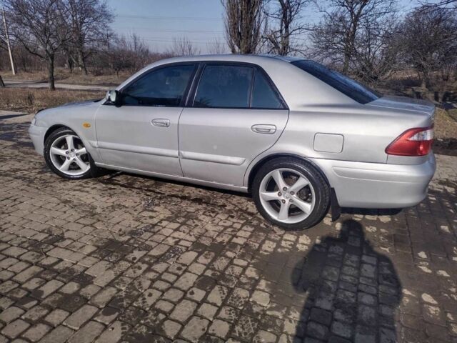 Сірий Мазда 626, об'ємом двигуна 1.8 л та пробігом 290 тис. км за 3100 $, фото 4 на Automoto.ua