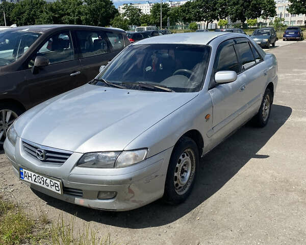 Серый Мазда 626, объемом двигателя 2 л и пробегом 300 тыс. км за 1349 $, фото 1 на Automoto.ua