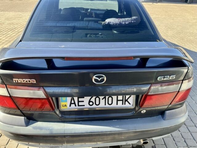Серый Мазда 626, объемом двигателя 1.8 л и пробегом 562 тыс. км за 2950 $, фото 1 на Automoto.ua