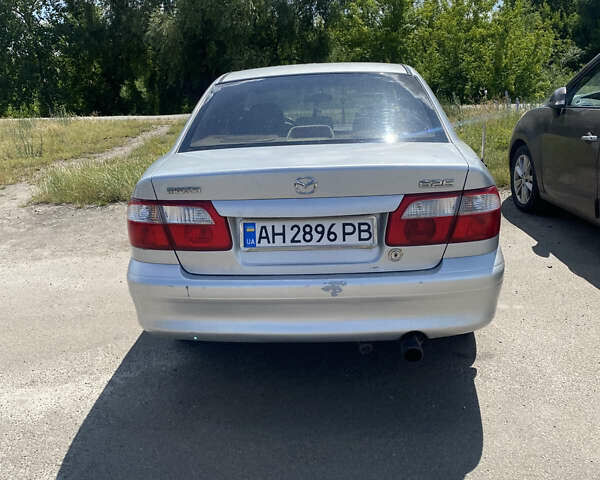 Серый Мазда 626, объемом двигателя 2 л и пробегом 300 тыс. км за 1349 $, фото 2 на Automoto.ua