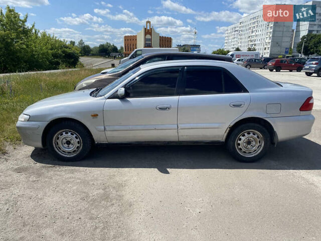 Серый Мазда 626, объемом двигателя 2 л и пробегом 300 тыс. км за 1349 $, фото 6 на Automoto.ua