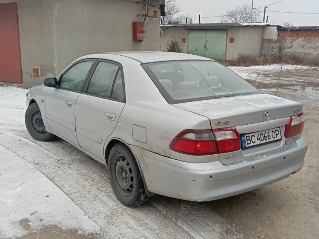 Серый Мазда 626, объемом двигателя 2 л и пробегом 371 тыс. км за 1900 $, фото 2 на Automoto.ua