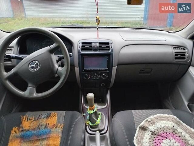 Серый Мазда 626, объемом двигателя 1.84 л и пробегом 312 тыс. км за 4500 $, фото 15 на Automoto.ua