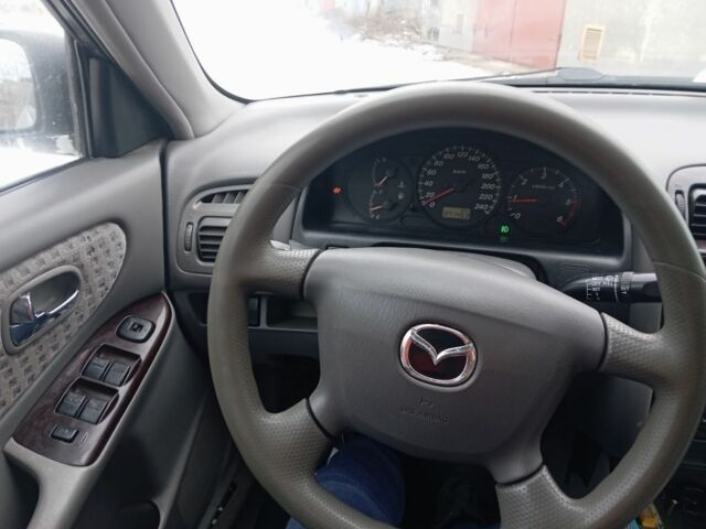 Серый Мазда 626, объемом двигателя 2 л и пробегом 371 тыс. км за 1900 $, фото 7 на Automoto.ua