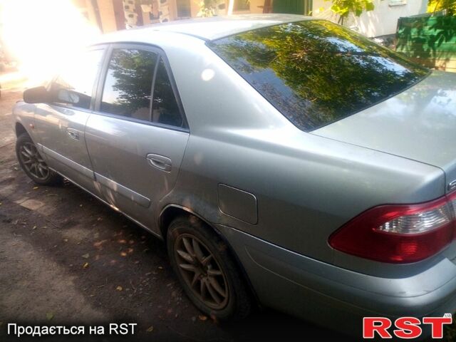 Серый Мазда 626, объемом двигателя 2 л и пробегом 301 тыс. км за 2750 $, фото 2 на Automoto.ua