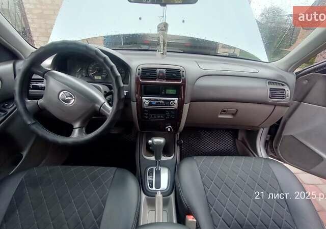 Серый Мазда 626, объемом двигателя 2 л и пробегом 341 тыс. км за 3500 $, фото 6 на Automoto.ua