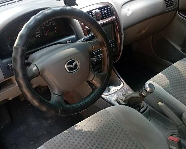 Сірий Мазда 626, об'ємом двигуна 2 л та пробігом 500 тис. км за 2700 $, фото 3 на Automoto.ua