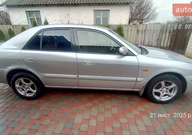 Серый Мазда 626, объемом двигателя 2 л и пробегом 341 тыс. км за 3500 $, фото 2 на Automoto.ua