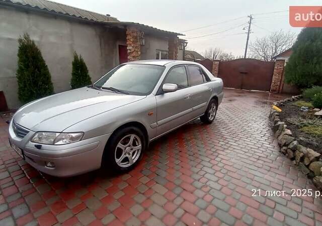 Серый Мазда 626, объемом двигателя 2 л и пробегом 341 тыс. км за 3500 $, фото 1 на Automoto.ua