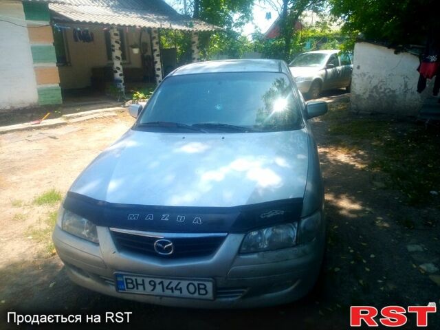 Серый Мазда 626, объемом двигателя 2 л и пробегом 301 тыс. км за 2750 $, фото 3 на Automoto.ua