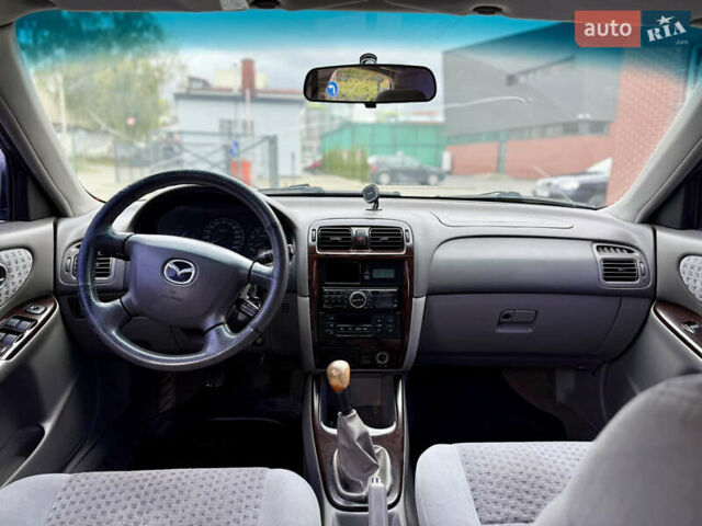 Сірий Мазда 626, об'ємом двигуна 2 л та пробігом 377 тис. км за 2222 $, фото 14 на Automoto.ua