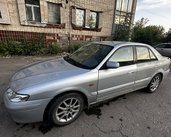 Серый Мазда 626, объемом двигателя 2 л и пробегом 310 тыс. км за 2300 $, фото 3 на Automoto.ua