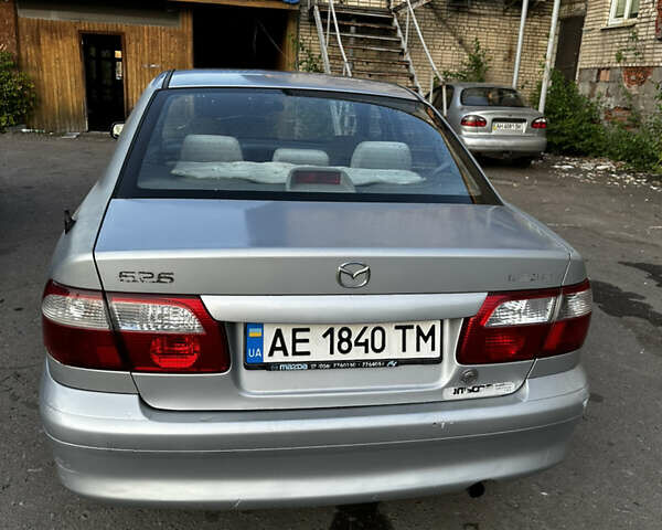 Серый Мазда 626, объемом двигателя 2 л и пробегом 310 тыс. км за 2300 $, фото 7 на Automoto.ua