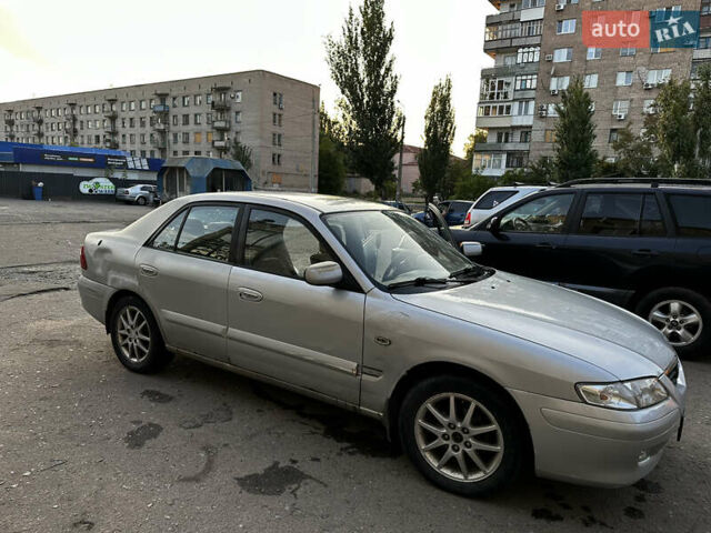 Серый Мазда 626, объемом двигателя 2 л и пробегом 310 тыс. км за 2300 $, фото 11 на Automoto.ua