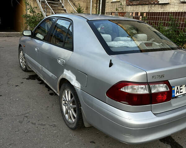 Серый Мазда 626, объемом двигателя 2 л и пробегом 310 тыс. км за 2300 $, фото 6 на Automoto.ua