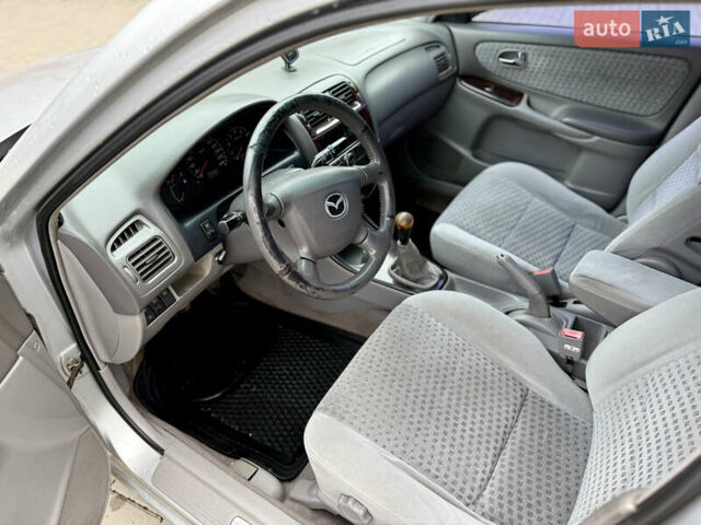 Сірий Мазда 626, об'ємом двигуна 2 л та пробігом 377 тис. км за 2222 $, фото 13 на Automoto.ua