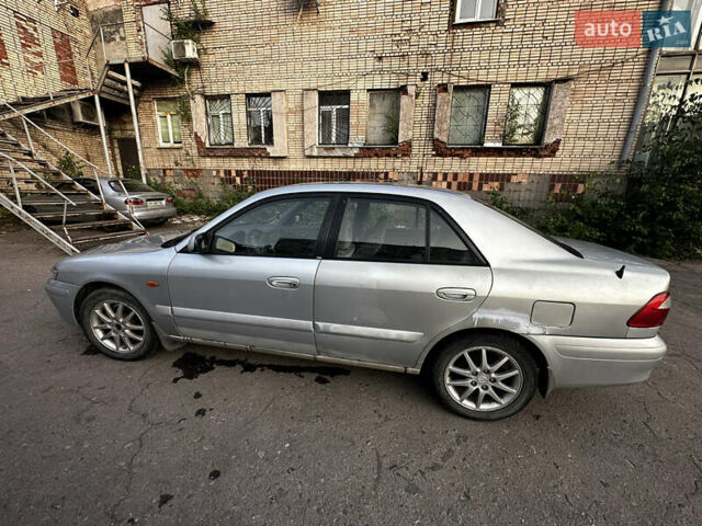 Серый Мазда 626, объемом двигателя 2 л и пробегом 310 тыс. км за 2300 $, фото 5 на Automoto.ua