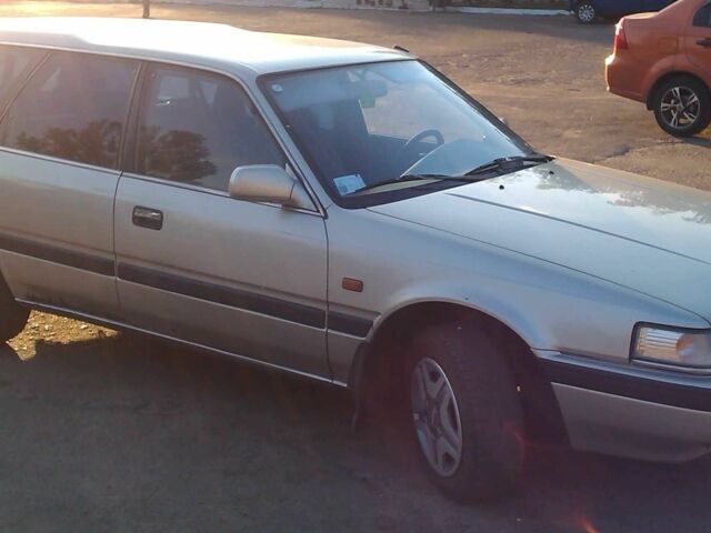 Серый Мазда 626, объемом двигателя 2 л и пробегом 400 тыс. км за 2300 $, фото 1 на Automoto.ua