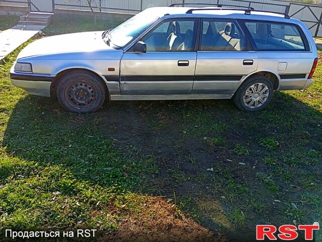 Серый Мазда 626, объемом двигателя 2 л и пробегом 318 тыс. км за 800 $, фото 1 на Automoto.ua