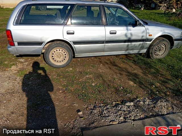 Серый Мазда 626, объемом двигателя 2 л и пробегом 318 тыс. км за 800 $, фото 3 на Automoto.ua