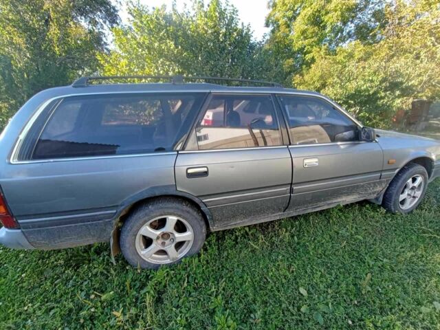 Серый Мазда 626, объемом двигателя 2 л и пробегом 100 тыс. км за 650 $, фото 2 на Automoto.ua