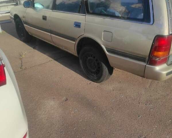 Сірий Мазда 626, об'ємом двигуна 2 л та пробігом 200 тис. км за 900 $, фото 4 на Automoto.ua