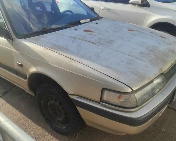 Сірий Мазда 626, об'ємом двигуна 2 л та пробігом 200 тис. км за 900 $, фото 2 на Automoto.ua