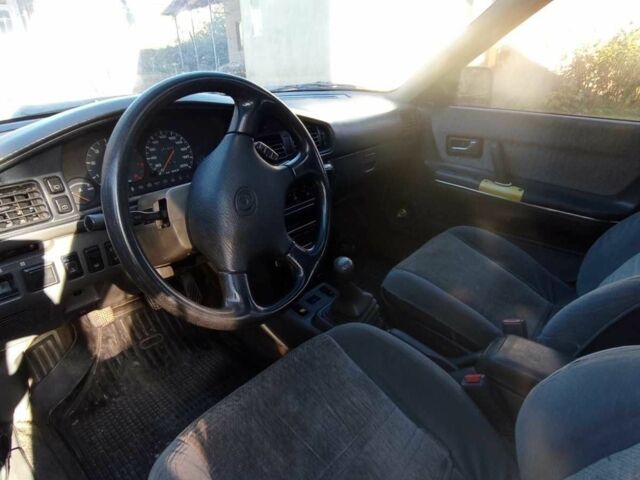 Серый Мазда 626, объемом двигателя 2 л и пробегом 100 тыс. км за 650 $, фото 4 на Automoto.ua