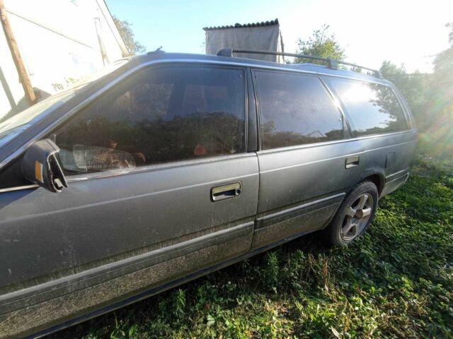 Серый Мазда 626, объемом двигателя 2 л и пробегом 100 тыс. км за 650 $, фото 3 на Automoto.ua